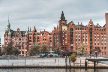 Speicherstadt red brick houses in Hafencity with cloudy sky, Hamburg, Germany