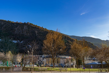 La Massana, Andorra. A lawn with green grass with a beautiful view of mountains