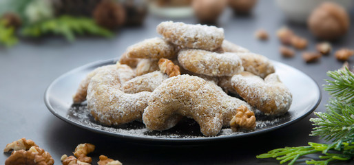 Christmas butter homemade cookies on dark background. Selective focus, effect toning.