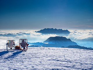 Sunbath in the italian alps during winter