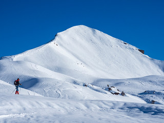 Naklejka na ściany i meble Mountaineering scene in the alps during winter