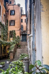 A beautiful Roman courtyard on Coronari street. Selective focus.   Rome, Lazio, Italy