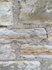 Textured background of the old stone wall.