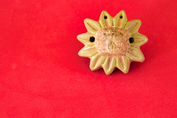 Tlapitzalli: flute made of mud, in the form of a feathered serpent (Quetzalcoatl)