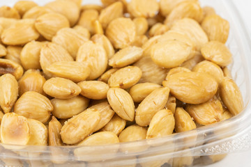 Salted dry roasted almonds in store packaging.