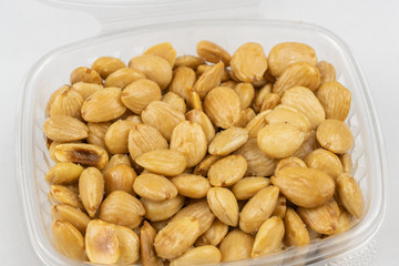 Salted dry roasted almonds in store packaging.
