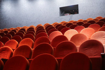 red seats in the cinema auditorium