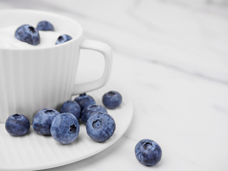 Blueberries in white sour cream