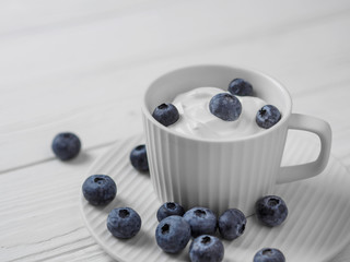 Blueberries in white sour cream