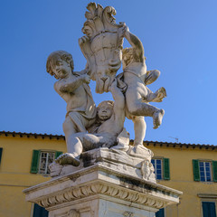 Fototapeta na wymiar Putty Fountain, Piazza dei Miracoli, Pisa, Tuscany, Italy