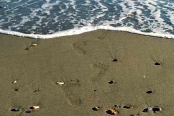 Footprints at sandy beach