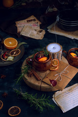 Warming mulled wine on dark background
