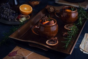 Warming mulled wine on dark background
