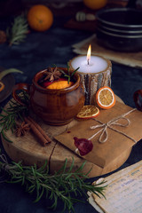 Warming mulled wine on dark background