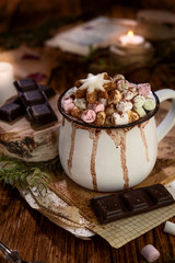 Hot chocolate with marshmallow on dark background