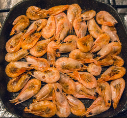 Large shrimp fried grill close-up.
