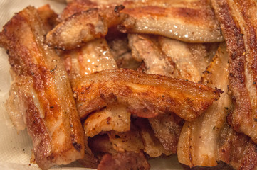 Grilled pork bacon close-up. Fried meat.