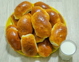 Freshly baked homemade pies with a glass of milk