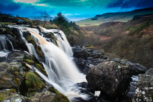 loup of fintry waterfalls, stirlingshire, scotland, uk.