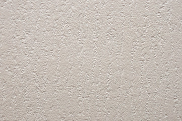 Embossed abstract pattern on beige paper