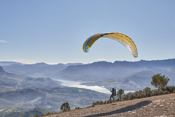 man doing paragliding in Lija Cadiz with blue sky