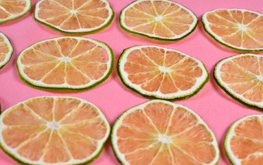 Dried lemons and limes in an electric dryer