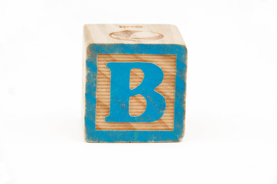 wooden block with the letter b isoloated on a white background