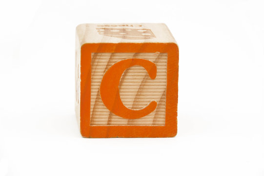 wooden block with the letter c isolated on white background