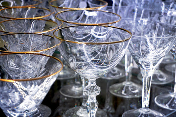 crystal glasses on a dark background