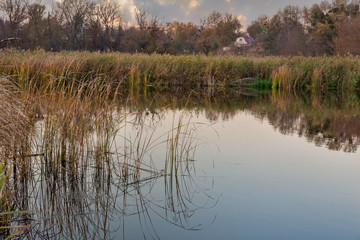 Fototapeta premium Autumn rural sunset river Ros landscape, Ukraine