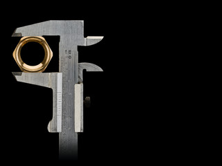 Measurement of the size of nut by an old calipers