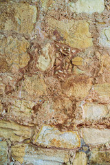 Naklejka premium old stone and stucco wall