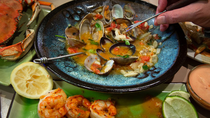 Steamed clams in garlic white wine broth