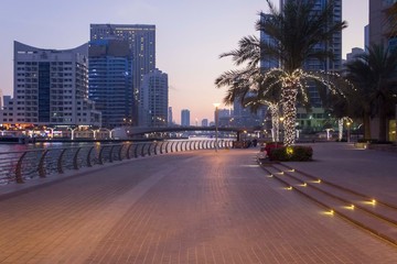 Fototapeta na wymiar Dubai Marina promenade at sunset time