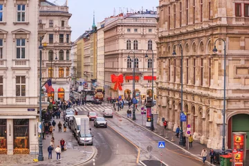Fotobehang Festive city landscape - view of the streets next to the Vienna State Opera on Christmas eve, Austria © rustamank