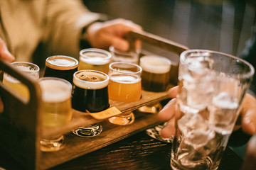 Close up of craft beer tasting flight on a bar table