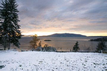 snow covered trees and mountains, sunset over the ocean, road trip seattle in winter
