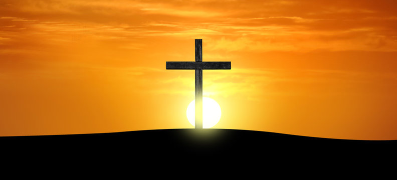 Cross silhouette at sunrise