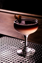 alcoholic beverage prepared in a glass with ice