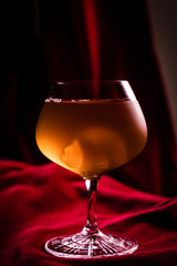 alcoholic beverage prepared in a glass with ice