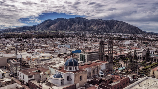 Tepic Cathedral in city centre of Tepic. State Nayarit in Mexico. Aerial drone view of Tepic and San Juan mountain.