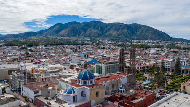 Tepic city center in State Nayarit in Mexico. Aerial drone view of Tepic and San Juan mountain.	