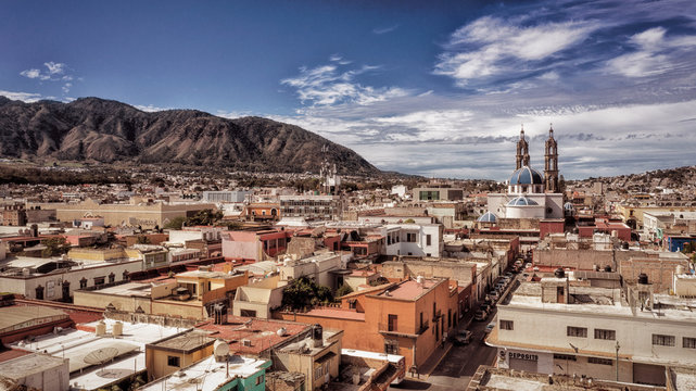 Tepic city in Nayarit Mexico. Panoramia Aerial drone view of town Tepic and San Juan mountain.	