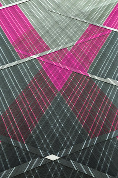 Digitally rendered image with polygonal structure of perforated panels. Abstract modern architecture background. Geometric pattern of parallel lines.