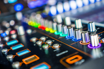 Sound and music industry. Sound effects soundboard. Sound recording studio background. Sound mixing desk with colorful buttons.