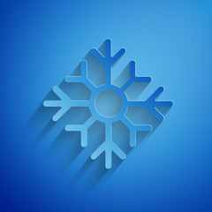 Paper cut Snowflake icon isolated on blue background. Merry Christmas and Happy New Year. Paper art style. Vector Illustration © Oksana