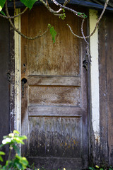 View of an old door on a mountain cabin