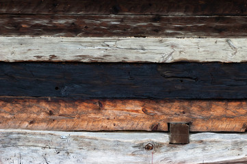 Obraz premium Old and wooden and horizontal planks. Wall of the cottage.