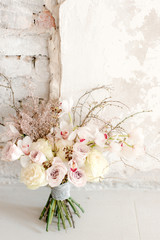 Beautiful wedding bouquet with orchid