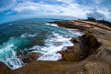 waves crashing on rocks